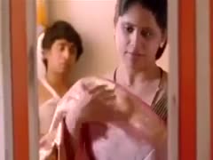 An Indian beauty lets her partner kiss her inside.